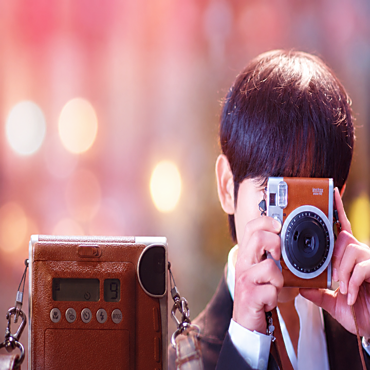 Instax Mini 90 in Our Sticky Love: Choose the Mini 99 or Mini Evo?